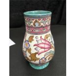 A Charlotte Rheas 8" vase, Persian pattern.