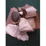 A box of several vintage fencing suits to include fencing mask.