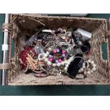 A basket of costume jewellery.