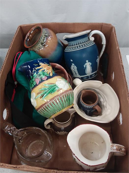 A box of mixed ceramics.