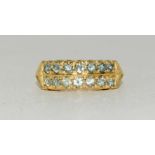 A 9 carat gold ladies' peridot bar set ring, size M.