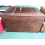 A large mahogany blanket box.