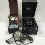 Vintage electrical items to include - 2 x volt meters, travel Iron and lamp with gun handle.