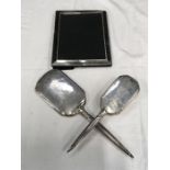 Silver photo frame 7.25" x 9.25" and dressing table mirror and brush set.