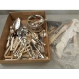 A quantity of kitchen cutlery and kitchen utensils.