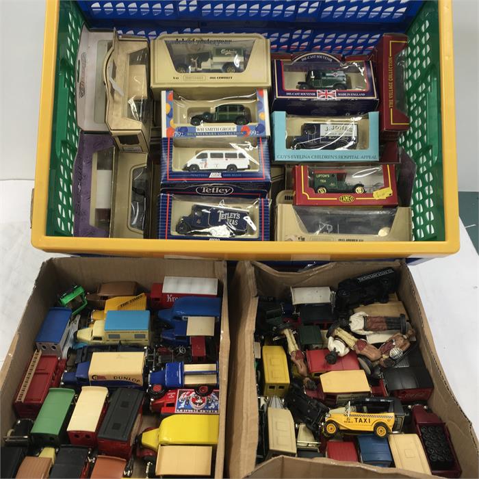 A large collection of model vintage cars and lorries. Some loose and some in their boxes.