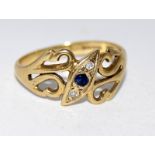 A 9 carat gold ladies' diamond and sapphire ring, size P.