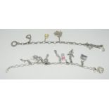 Two ladies' silver charm bracelets and 13 charms.