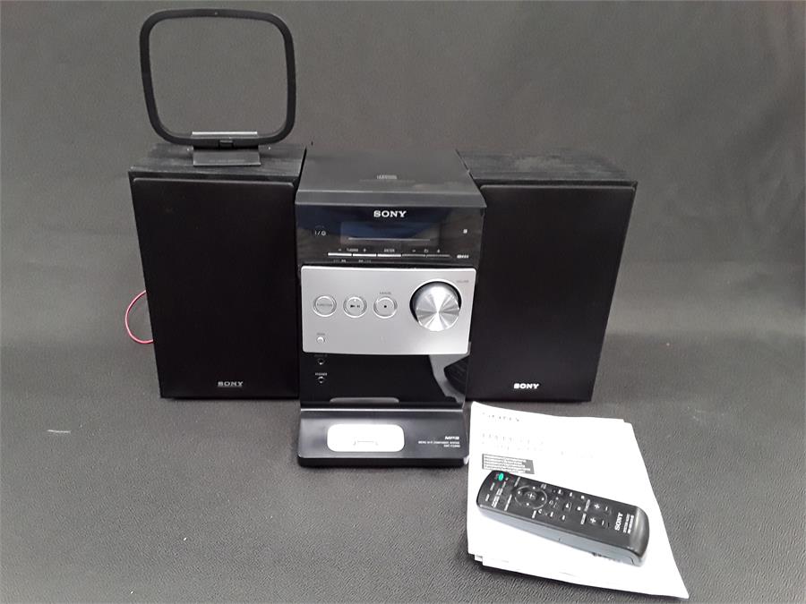 A Sony CMT-FX300i Micro Hi-Fi Component System. Radio, CD, Aux and IPod. Comes with remote,