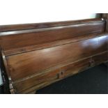 A reproduction mahogany French bed (Super King size).