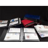 A very large collection of 6 albums of First Day Covers together with a large quantity of loose