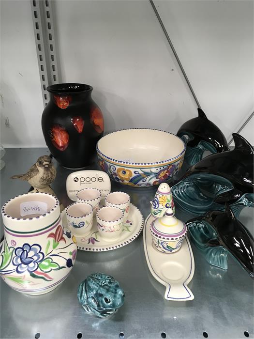 A quantity of Poole Pottery to include living glaze, traditional and animals.