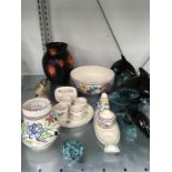 A quantity of Poole Pottery to include living glaze, traditional and animals.