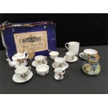 A Hadley's Worcester small lidded potpourri. The Alexandra Toy Tea Set with original box, a