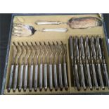 A boxed set of silver plated fish knives and forks including servers. (12 place settings).