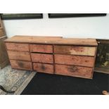 A Victorian pine shop chest/pharmaceutical chest of six drawers, stained red (af).