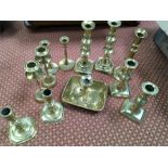 Five pairs of 19th century candlesticks together with a chamber stick and one other.