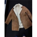 A gents sheepskin coat.