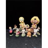 A quantity of Warner Bros Carosello figures to include two larger Sweetie Pie with Speedy Gonzales.