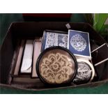 A box of photos etchings and decorative lace etc.