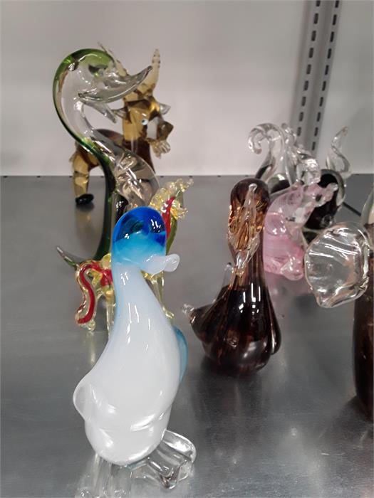 Ten various coloured glass animals.