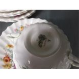 The residue of a Royal Doulton 'Arcadia' china dinner service together with a piece of Shelley