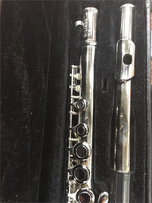 A silver plated Lindo flute in case.