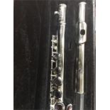 A silver plated Lindo flute in case.