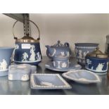 A large quantity of Wedgwood Jasperware in shades of blue together with other china and glass.