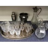 A collection of lead crystal glasses, cocktail shaker and ice bucket.