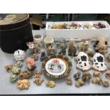 Selection of ornamental pigs, other animals and hat box.