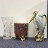 A vase depicting a heron together with two others.