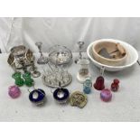 A selection of glassware with some silver plated ornaments and bowls.