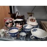 A quantity of Toby jugs with some Cluster Ware china and other china.