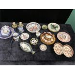 A large collection of Quimper ware including egg cups, bowls and plates etc.