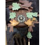 An American wall clock together with a rack strike movement cuckoo clock (restoration needed).