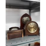 Three various chiming mantle clocks. One very damaged, needs restoring.