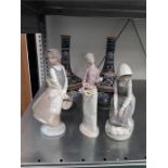 Three china lady NAO figures and two Derula vases.