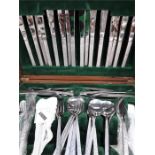 A box of Viners studio designed by Gerald Benny cutlery together with a box of other cutlery.