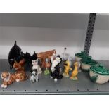 A large collection of mainly glazed china animals including Poole Pottery, Lladro, Beswick and three