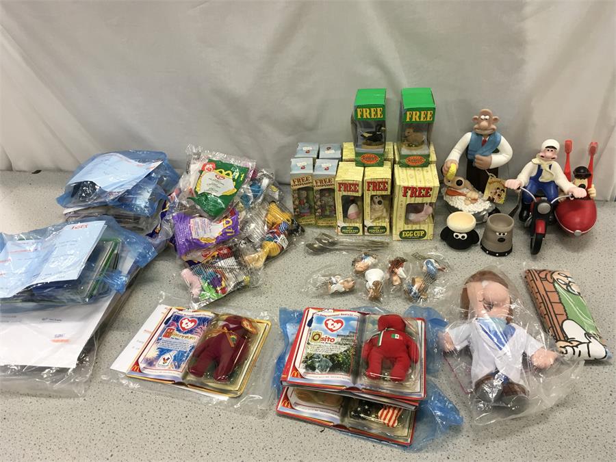 A quantity of Ty Beanie Babies from America, Wallace & Gromit figures and Tetley wildlife.