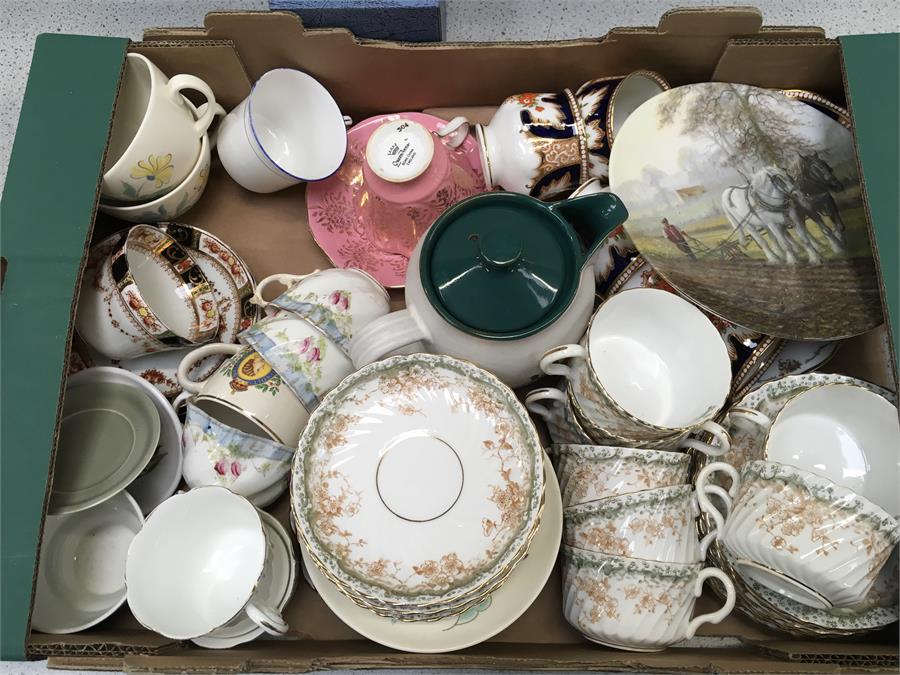 Two boxes of china cups and plates, examples from Wedgwood, Tuscan, Willow and others.