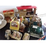 Sylvanian family items to include figures, a caravan, a shop and a car.