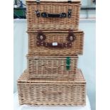 Four wicker hampers.