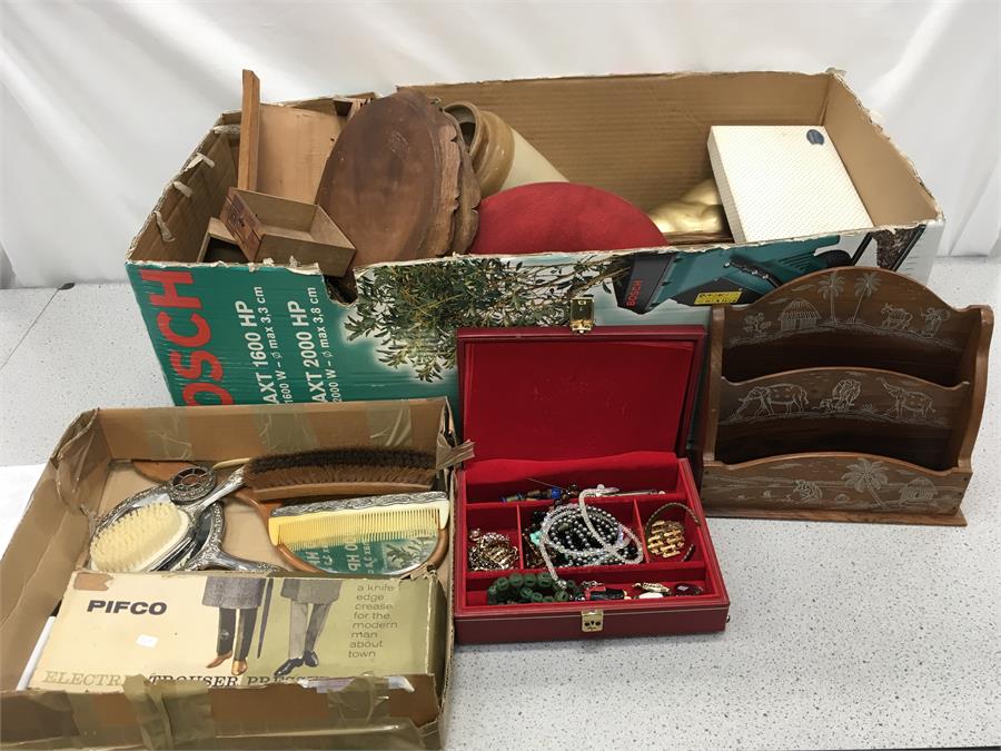 A box containing jars, wooden items, costume jewellery and other items.