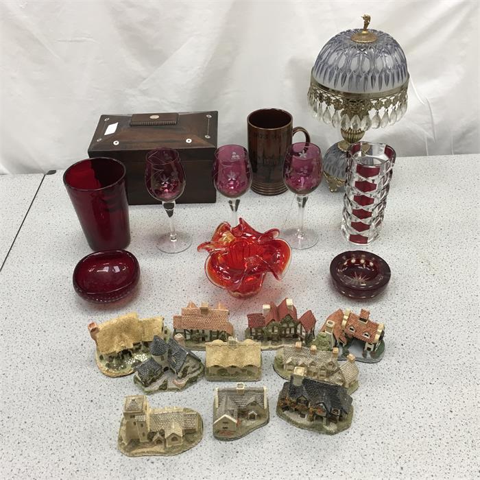 A selection of glassware together with a lamp and a quantity of David Winter model cottages.