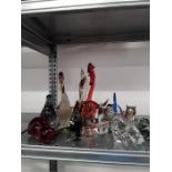 A large quantity of various glass animals.