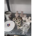 A small quantity of topographical commemorative china. kings and queens of England napkin rings etc