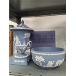 A large blue Wedgwood Jasperware urn with a blue Jasperware bowl and box.