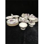 A tea set in Victorian Violet pattern by Hammersley, for six people together with a two sectioned